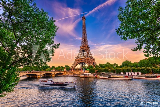 Bild på Paris Eiffel Tower and river Seine at sunset in Paris France Eiffel Tower is one of the most iconic landmarks of Paris